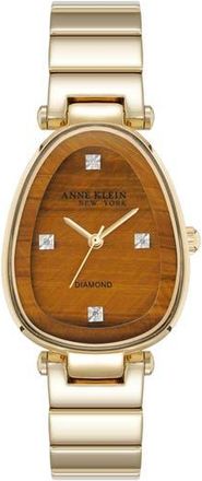 Anne Klein Diamond Dial Three Hand Quartz Bracelet Watch, 26mm x 38mm in Goldtone/Tiger at Nordstrom Rack