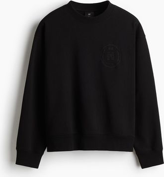 H&M Sweatshirt mit Print in Regular Fit - Schwarz
