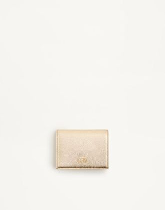 Valentino Garavani VLogo Signature wallet in Laminated grainy calfskin with jewel logo Woman GOLD/CRYSTAL UNI