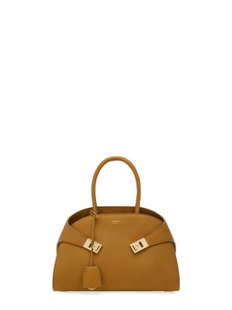 Ferragamo Curved Silhouette Structured Handbag with Gold Accents
