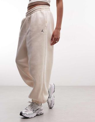 Nike Jordan Brooklyn joggers con fondo elasticizzato color crema-Bianco