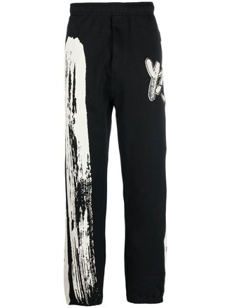 Yohji Yamamoto Pantaloni sportivi con stampa - Nero