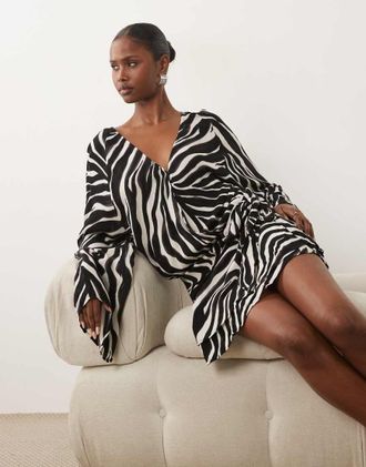 Gina Tricot Gina Tricot vestito corto in chiffon con maniche lunghe e scollo a V con stampa zebra nera-Nero
