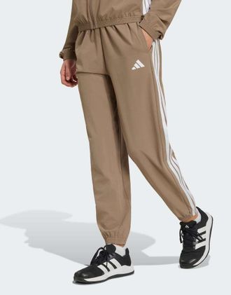 adidas adidas Performance - Train Essentials - Pantaloni kaki con 3 strisce-Verde