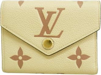 Louis Vuitton Cream Wallet (Tri-Fold) (Pre-Owned)