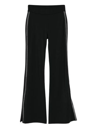 Michael Kors logo-tape flared trousers - women - Nylon/Elastane - S - Black