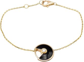 Cartier Bracciale Amulet in oro rosa 18kt con diamanti e onice anni 2010