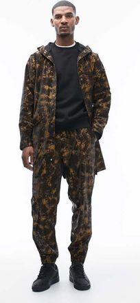 Rains Rain - 18560 - Pantaloni regular fit impermeabili con coulisse marroni con stampa effetto fango-Marrone