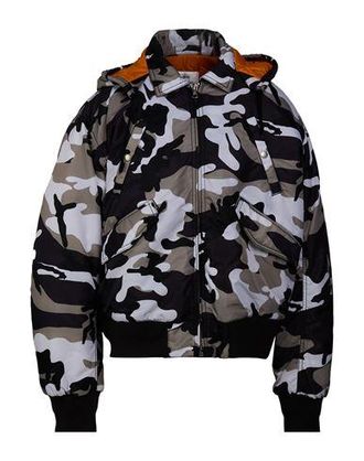 St&uuml;ssy ROPA DE ABRIGO - Plum&iacute;feros y acolchados en YOOX.COM