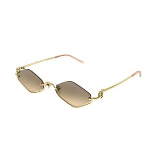 Gucci Stijlvolle zonnebril met gouden montuur - Heren - Accessoires - Geel - Maat: 53 MM