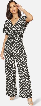 Yumi Geometric Print Wrap Jumpsuit in Black at Nordstrom, Size 12