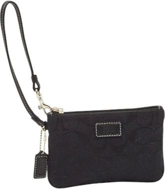 Coach Pre-owned Clutches, female, Black, Size: ONE SIZE Pre-owned Signature Canvas Clutch