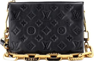 Louis Vuitton Borsa a tracolla Coussin BB in pelle di agnello goffrata con monogramma - Nero