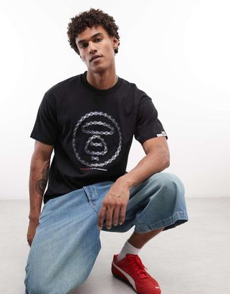 Aape By A Bathing Ape Aape by A Bathing Ape T-shirt nera con stampa logo-Nero