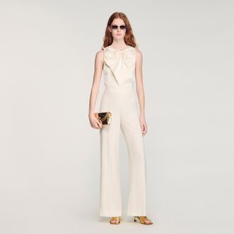 Sandro Buttoned-slit straight-leg trousers