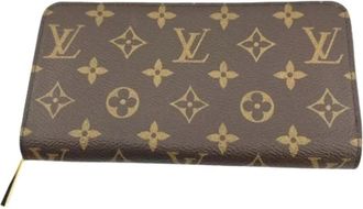 Louis Vuitton Pre-owned Lange portemonnee (bi-fold) - Dames - Vintage Accessoires - Bruin - ONE Size - Vintage
