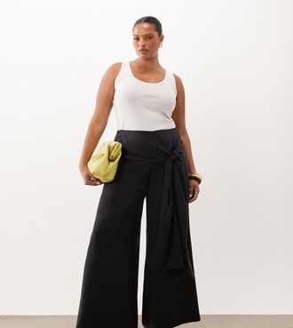 Asos Curve ASOS DESIGN Curve pantaloni a gamba ampia con dettaglio avvolgente neri-Nero