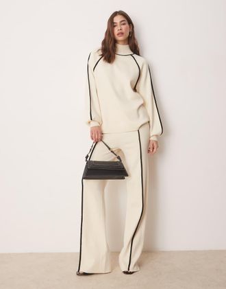 Vero Moda Pantaloni a vita alta in maglia crema con cucitura a contrasto nera in coordinato-Bianco