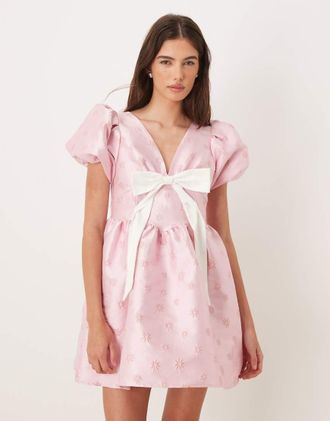 Sister Jane Esclusiva Sister Jane - Vestito corto rosa con scollo a V e maniche a sbuffo con fiocco