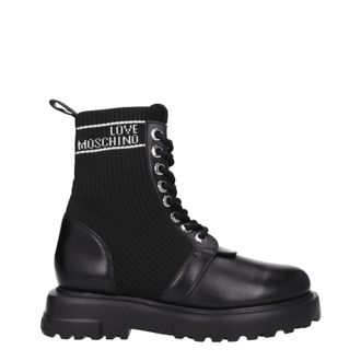 ショートブーツ・ブーティ MOSCHINO COUTURE Woman Flat ankle boots Black MA21903G1HM28 Moschino Flat Ankle Boots In Black - 10% Off | Editorialist