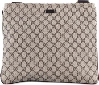 Gucci GG gecoate canvas crossbodytas met rits - Bruin