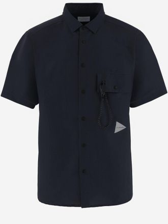 And Wander Camisa de nailon con bolsillo de parche de And Wander