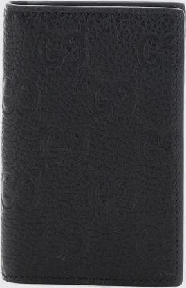 Gucci Portacarte bifold in pelle di vitello con monogram GG impresso