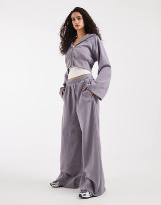 New Balance Coastal - Pantaloni in pile grigio spazzolato