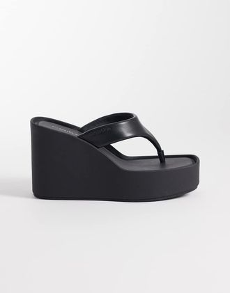Calvin Klein Jeans - Sandali infradito in pelle neri con zeppa-Nero