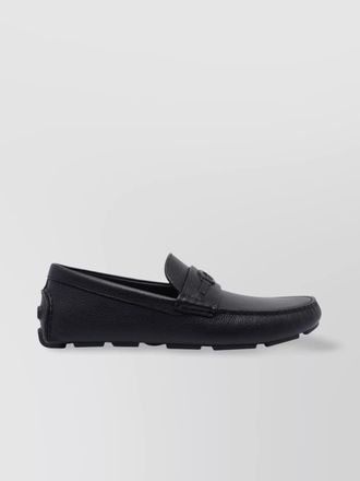 Gucci pebbled leather driver loafers with rubber sole