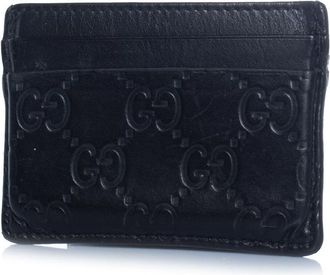 Gucci Gucci kaarthouder van zwart leer met monogramreli&euml;f
