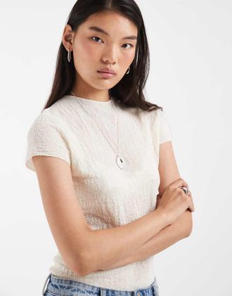 & Other Stories top in maglia semitrasparente a maniche corte con collo alto bianco