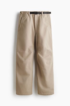H&M Weite wattierte Skihose mit StormMove - Beige