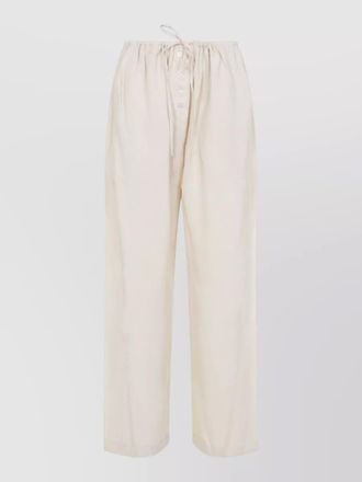 STUDIO NICHOLSON hera drawstring trousers button waist pockets