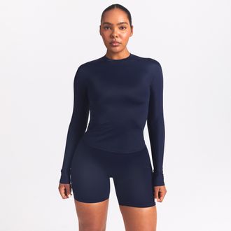 Nike Womens SKIMS Shine Long-Sleeve Crew-Neck Top in Blue | TPLST3249-NVY