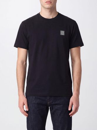 Stone Island T-shirt in cotone con applicazione patch logo sulla manica
