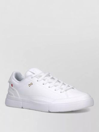 On low top sneakers perforated toe design