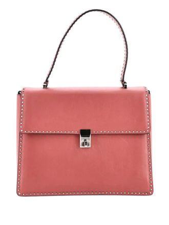 Valentino Garavani Turnlock Top Handle Bag Leather with Micro Rockstuds Medium satchel - Rosa