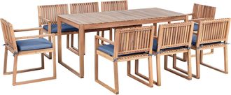 Beliani Conjunto De Comedor Exterior 8 Plazas R&uacute;stico De Madera De Acacia Certificada Mesa Y Sillas Con Cojines Azules Marr&oacute;n Sassari Premium