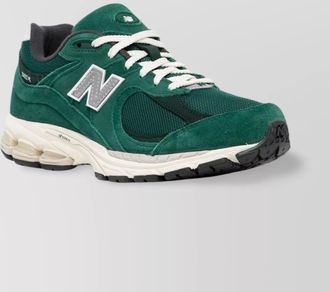 New Balance almond toe leather sneaker logo