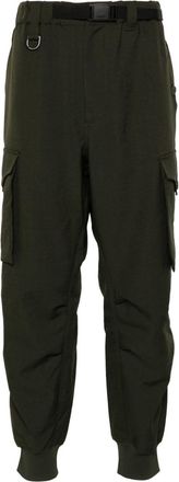 Yohji Yamamoto logo-print trousers - men - Recycled Polyester/Polyamide/Cotton/Elastane - M - Green