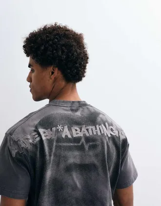 Aape By A Bathing Ape Aape by A Bathing Ape - T-shirt oversize nero slavato con stampa grande sul retro