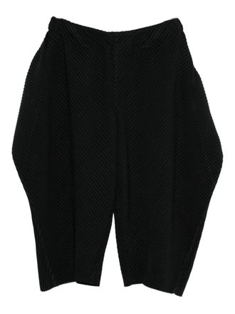 Homme Pliss&eacute; Issey Miyake cropped wide-leg trousers - men - Polyester - 2 - Black