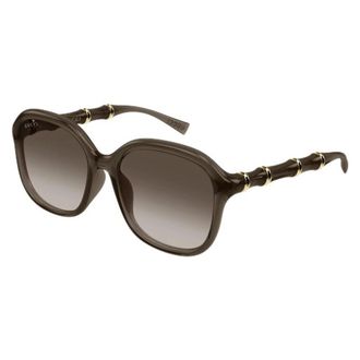 Gucci Accessoires, unisex, Bruin, ONE Size, Bamboe, Zonnebril met bamboe-detail en rond montuur
