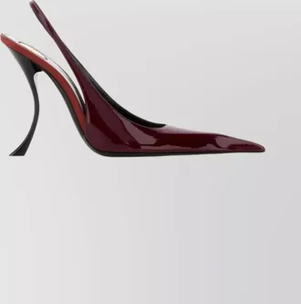 Saint Laurent leather pumps with curved heel and glossy finish