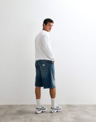 Carhartt Work in Progress Landon shorts in denim a gamba larga e affusolati lavaggio blu con effetto schizzi di vernice