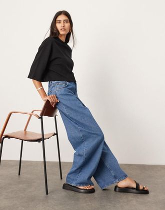 Asos ASOS Edition - Dusty - Jeans a fondo ampio blu medio con elastico in vita sul retro-Nero
