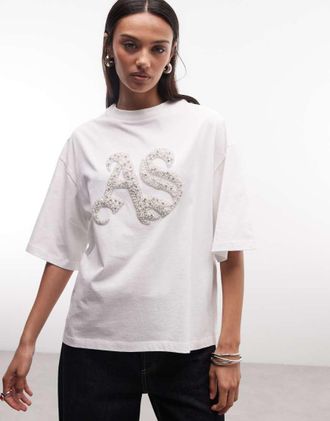 AllSaints Icon Amelie - T-shirt a maniche corte bianca con logo decorato con perle-Bianco