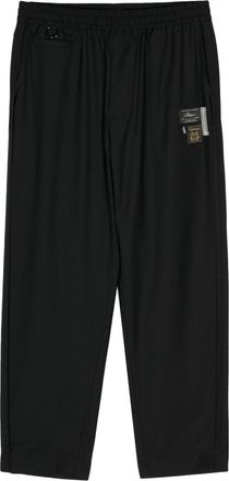 Undercover logo-appliqué straight trousers - women - Polyester/Wool - 3 - Black