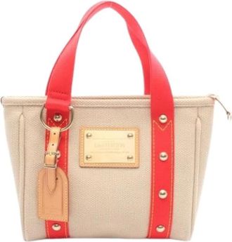 Louis Vuitton Pre-owned Mini Bags, female, Beige, Size: ONE SIZE Pre-owned Canvas Mini Bag